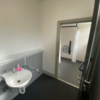 A sink and walk in shower